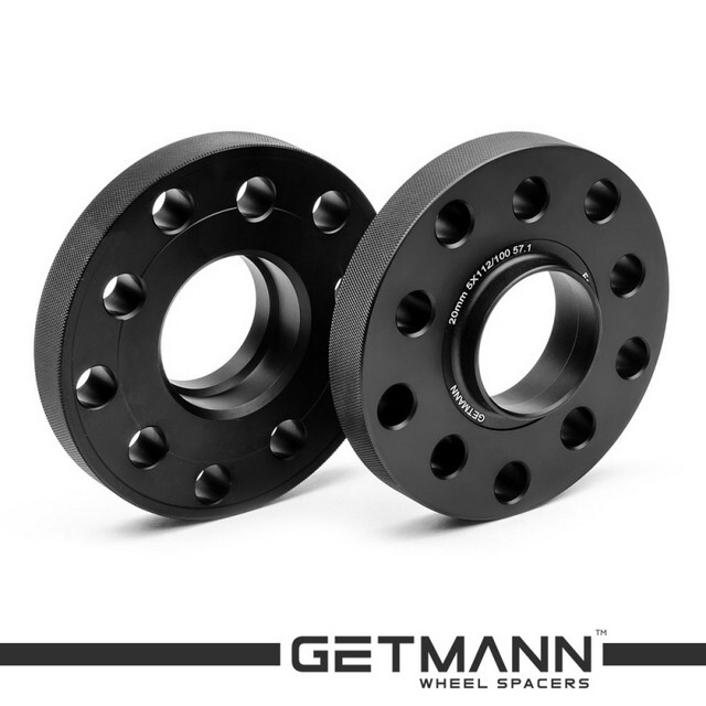 Автомобільне розширювальне кільце (Spacer) GETMANN H = 20 мм PCD5x112 -> PCD5x100 DIA57.1, Кована/Чорна